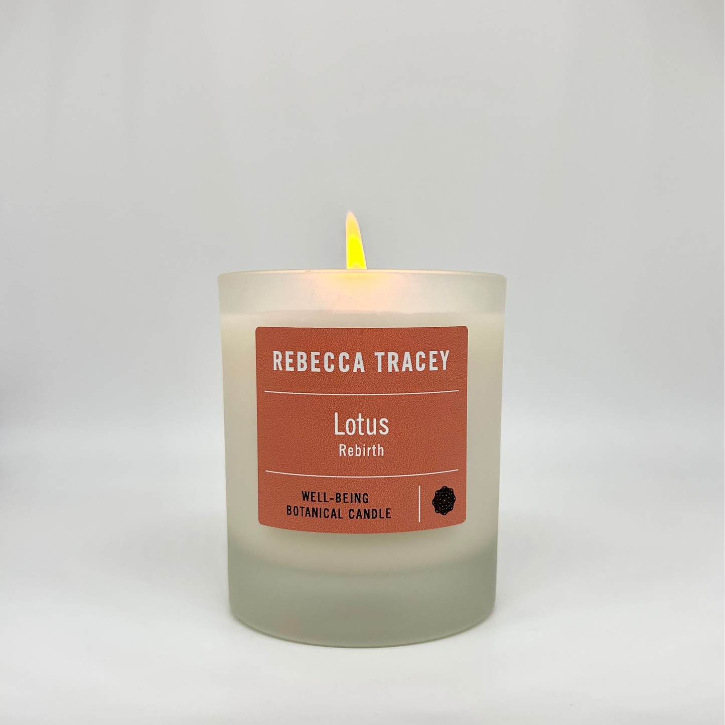 white glass, lotus label, orange, with flame