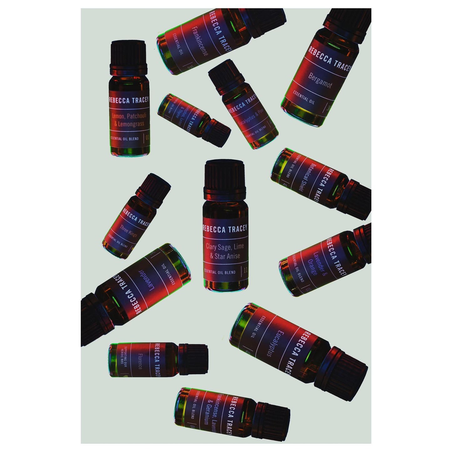 lots of essential oils on a white background